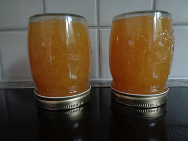 Fill the jam into the glasses. Put jars upside down